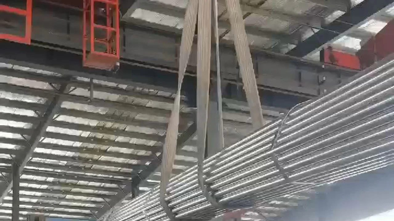 Pre-galvanized steel tube bundle being lifted during loading